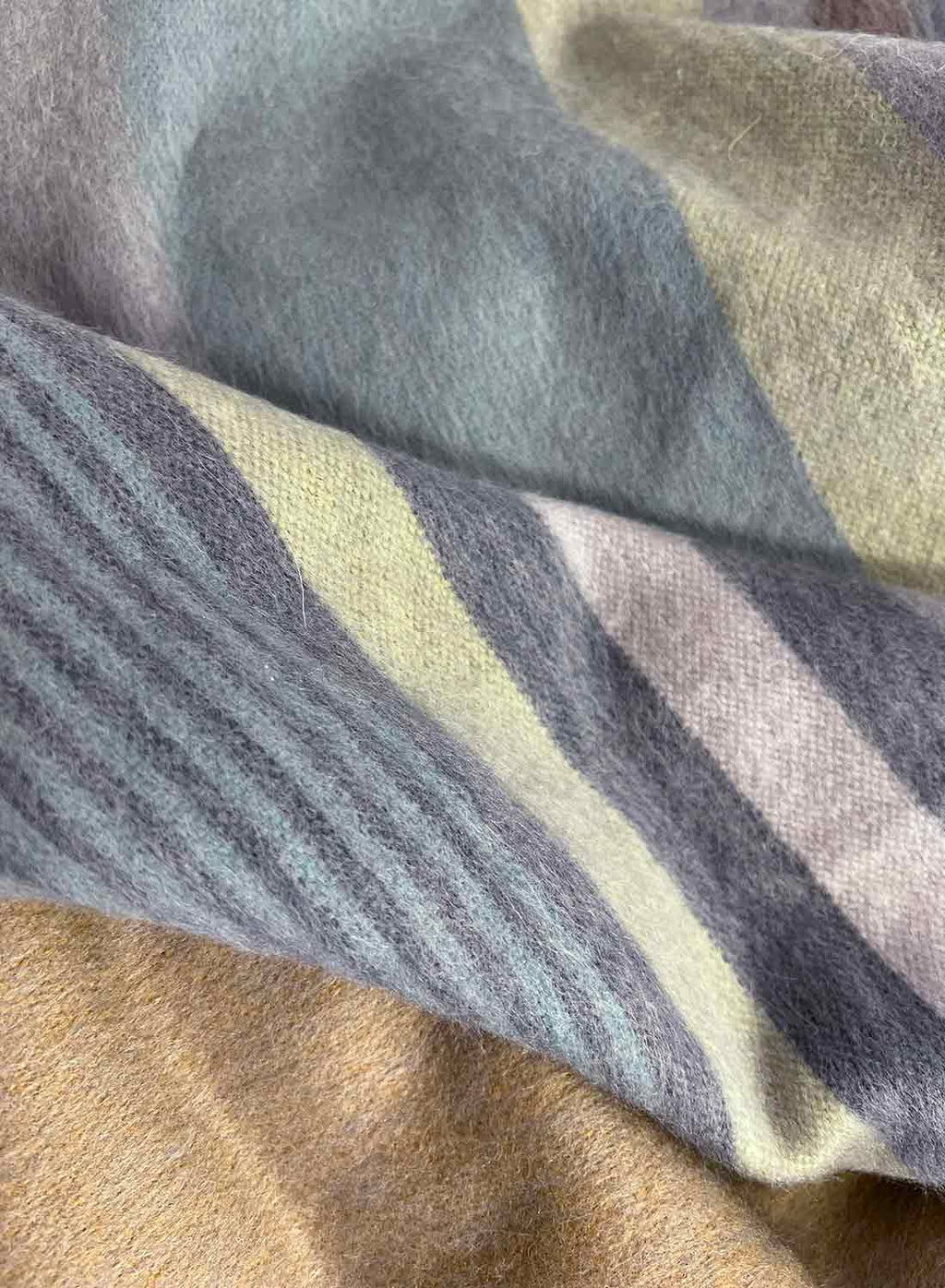 Gold Rush alpaca throw blanket with camel and denim-blue geometric pattern, Shupaca