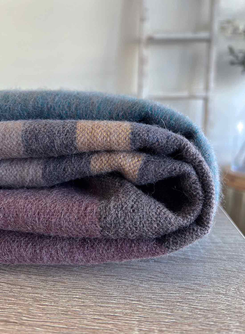 Jade Forest alpaca throw blanket with teal and earthy grey reversible stripes, Shupaca