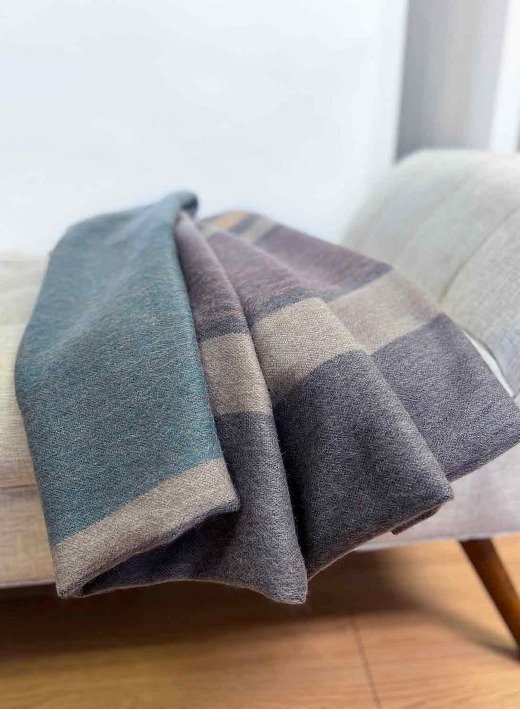Jade Forest alpaca throw blanket with teal and earthy grey reversible stripes, Shupaca