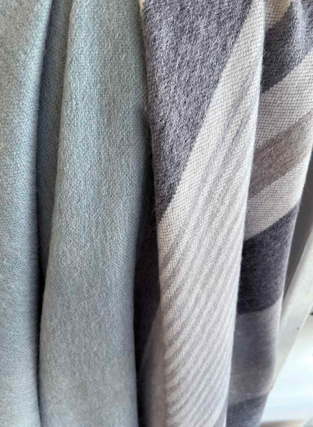 Grey alpaca throw blanket in Silverlake with lake-blue reverse, Shupaca