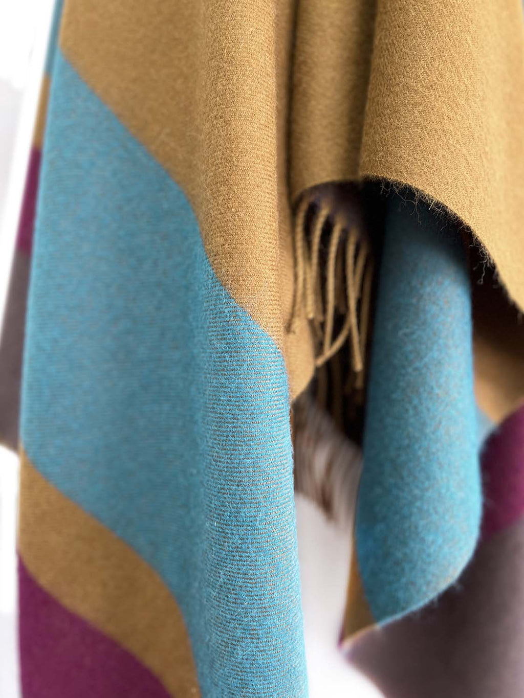 Golden brown 100% baby alpaca throw blanket with magenta and teal accents, Shupaca