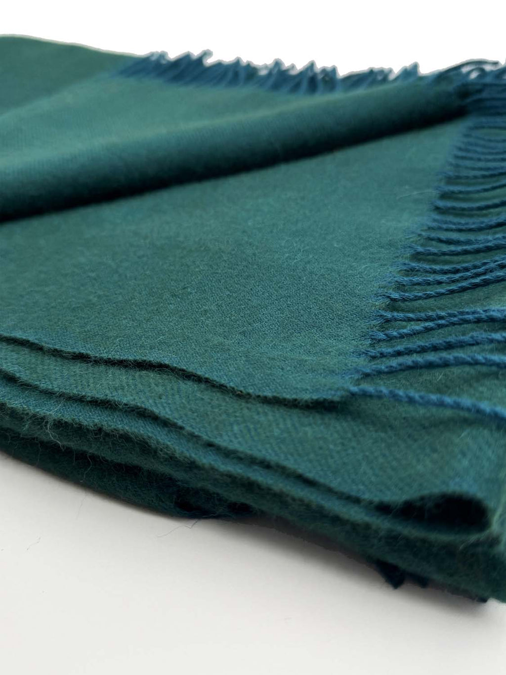 Emerald green 100% baby alpaca throw blanket in Jasper with teal tones, Shupaca