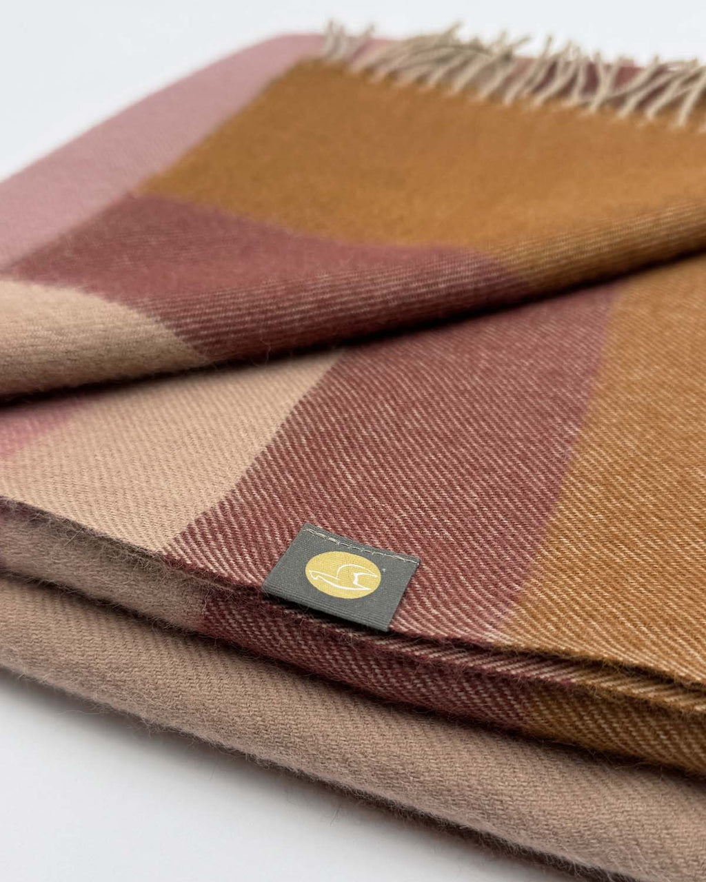 Mocha Mousse 100% baby alpaca throw blanket with blush rose and caramel, Shupaca