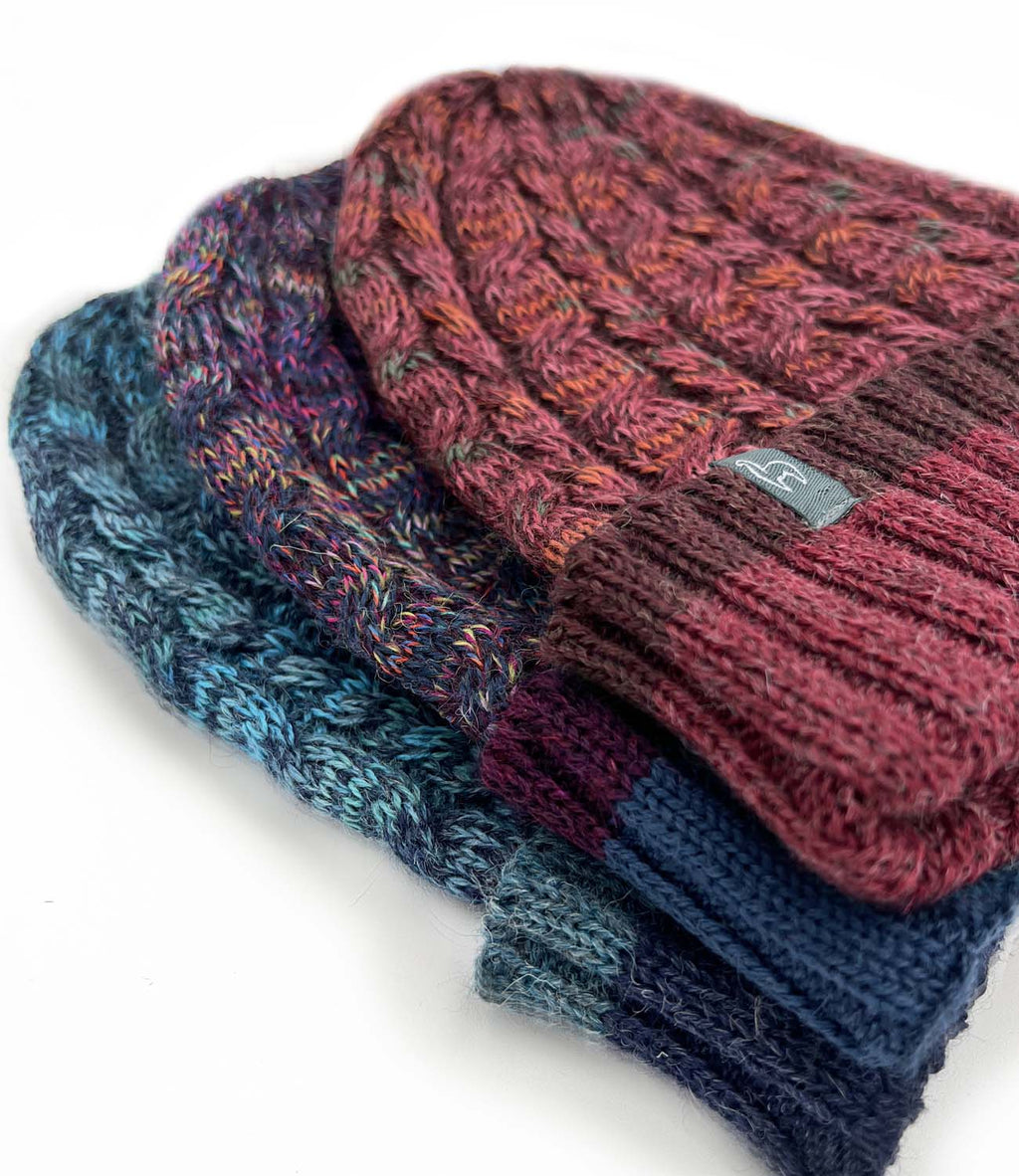 Teal alpaca beanie in Ocean Drift with navy blue tones, Shupaca