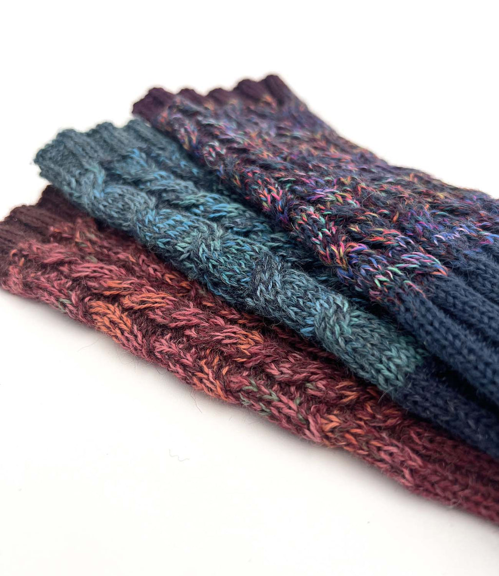 Blue alpaca gloves in Galaxy with plum and orange bursts, Shupaca