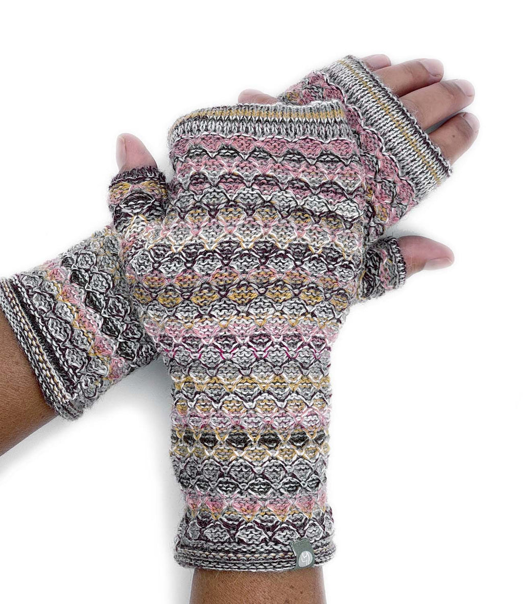 Terracotta alpaca gloves in Canyon with sandstone, Shupaca