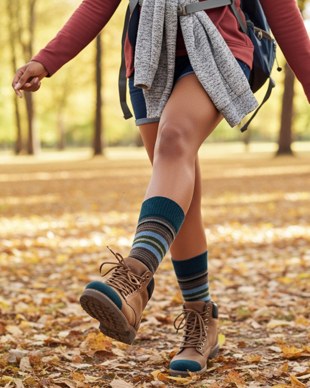 Blue alpaca socks in Riverun with green and brown stripes, Shupaca