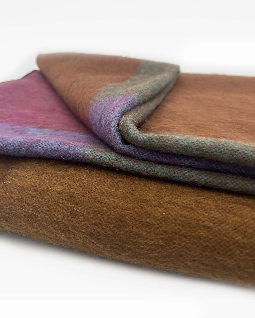 Forest green alpaca throw blanket in Kaleidoscope with copper and purple blocks, Shupaca