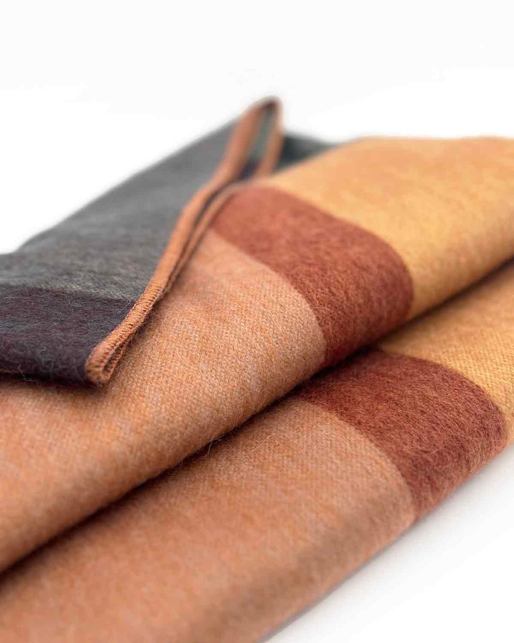 Beige alpaca throw blanket in Mojave with terracotta and taupe, Shupaca