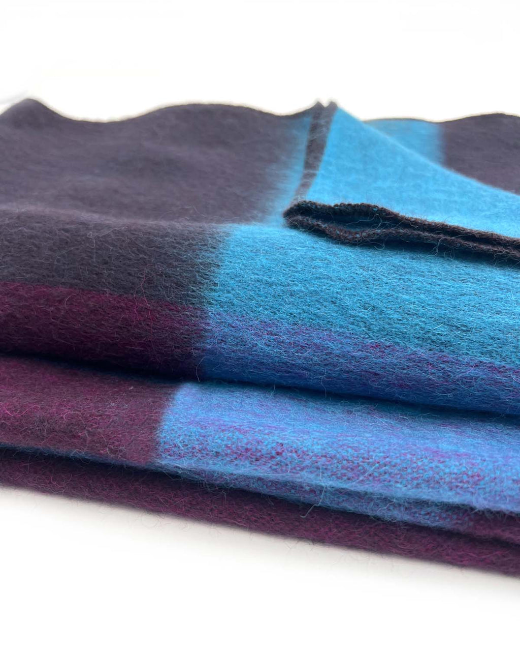 Sky Blue alpaca throw blanket in Nightfall with wine and charcoal, Shupaca
