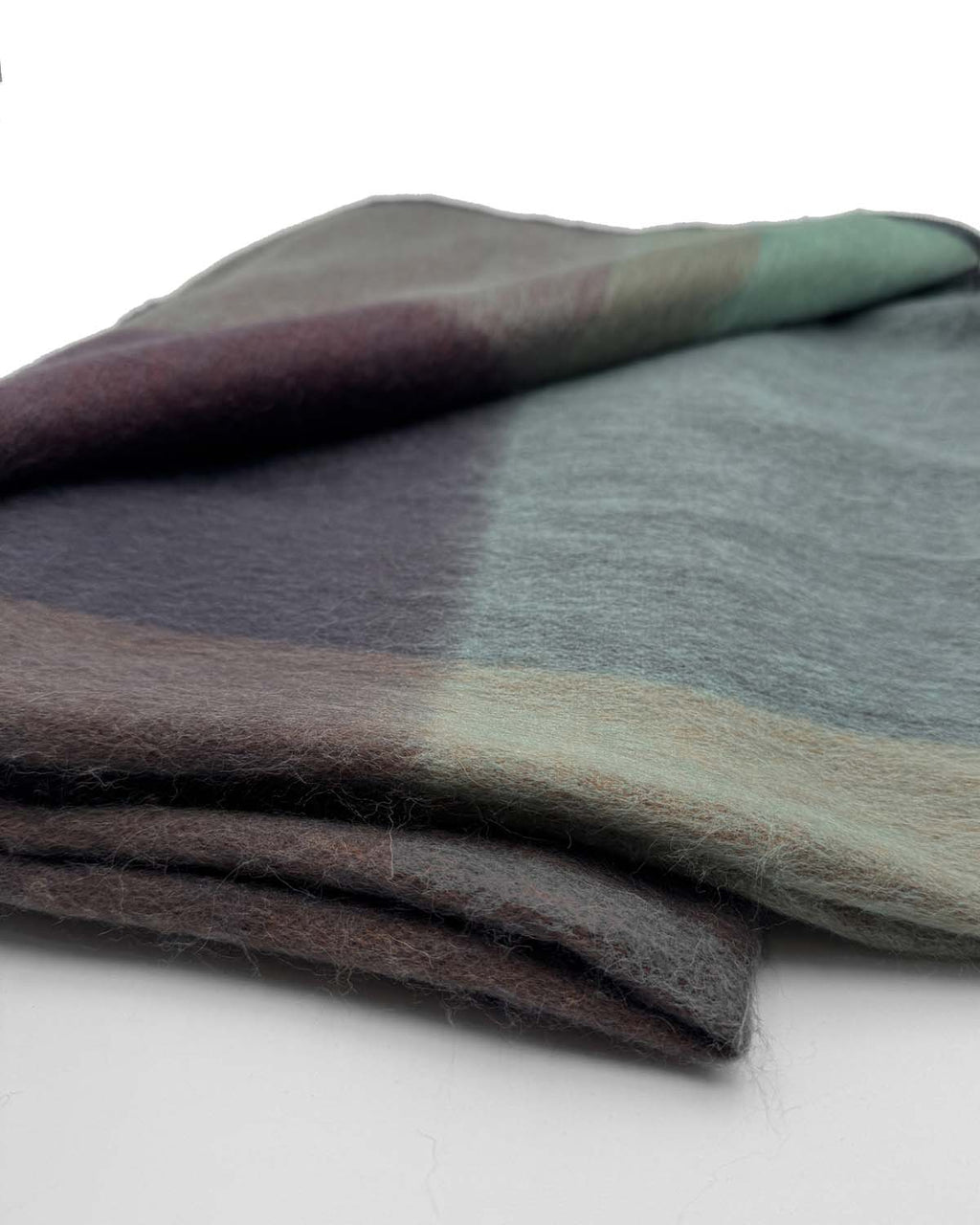 Wine alpaca throw blanket in Twilight with midnight blue and sage accents, Shupaca