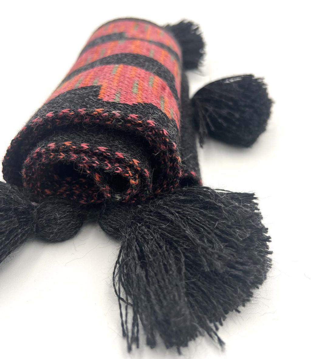 Pink kid's alpaca scarf in Rosey Paca with paca silhouettes and tassels, Shupaca