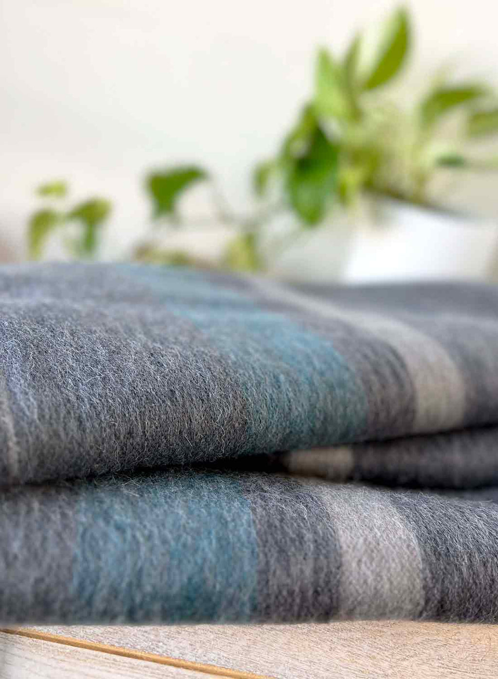 Sky Blue alpaca throw blanket in Calypso with denim and grey stripes, Shupaca