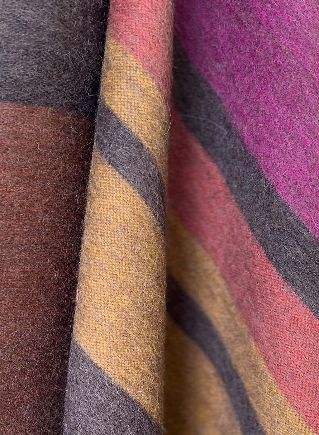 Golden alpaca throw blanket in Canyon with clay and magenta stripes, Shupaca